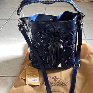 Patricia Nash cut out tooling bucket bag in Patriot Blue